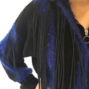 Beautiful Hand-made sweater with black fringe.